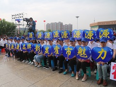 2015年7月参加市里庆祝活动